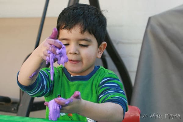 boy playing with slime 