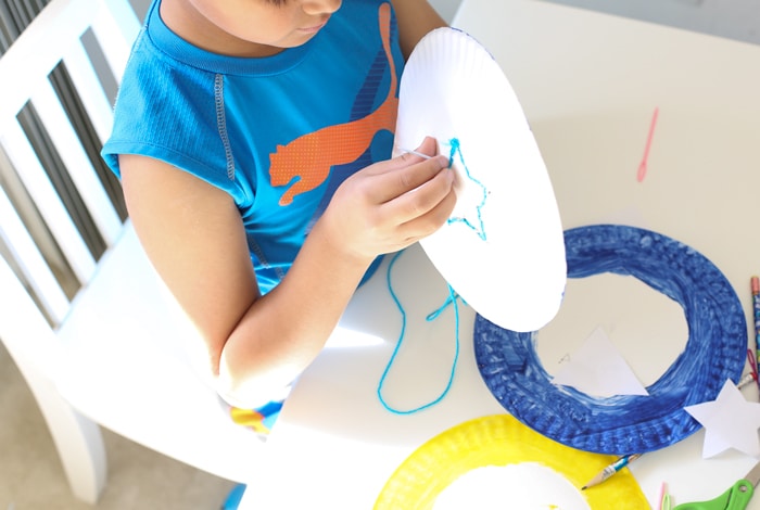 star shaped kids activity that works on fine motor control and weaving