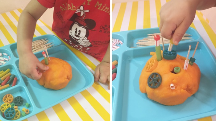 What happens when you take a toddler, take out a tinker tray, add play dough, toothpicks and some pasta? A unique end result