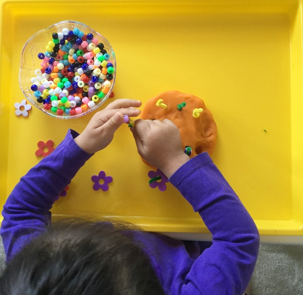 spring is around the corner and this playdough fine motor skills activity is perfect for your toddler or preschool child