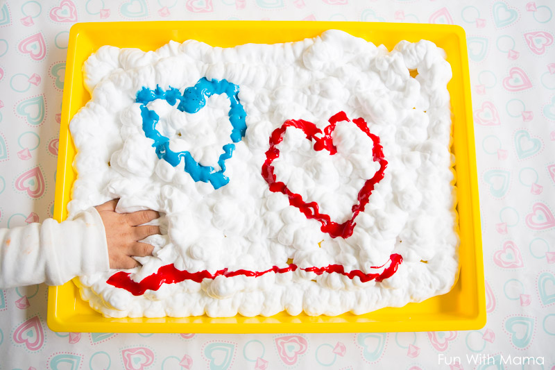 paint in the shape of a heart in shaving cream