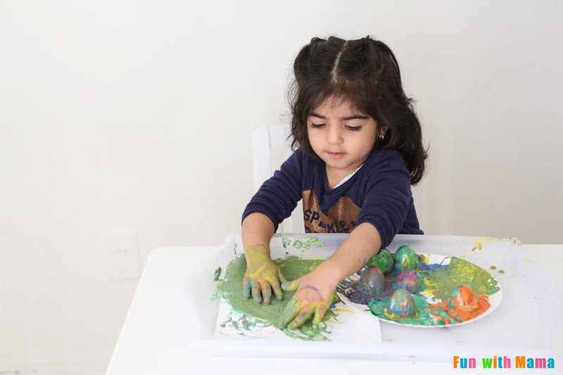 toddler finger painting for sensory art 