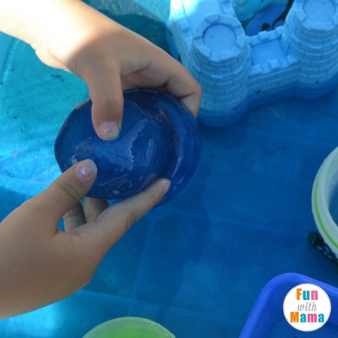 Under the Seas sensory bin playing with ice (Small)