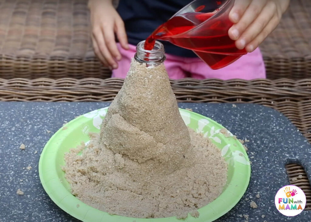 how to make a volcano with sand water and a glass