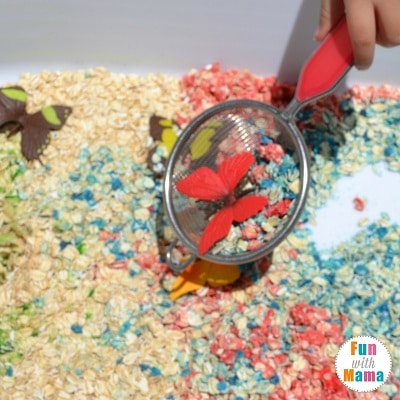 rainbows and butterflies sensory bin scooping