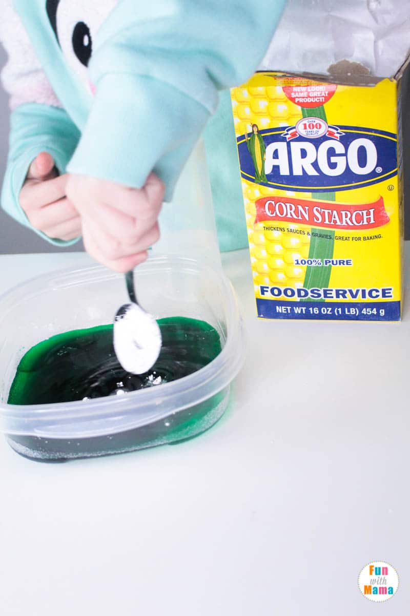 mixing in the corn starch for this oobleck recipe 
