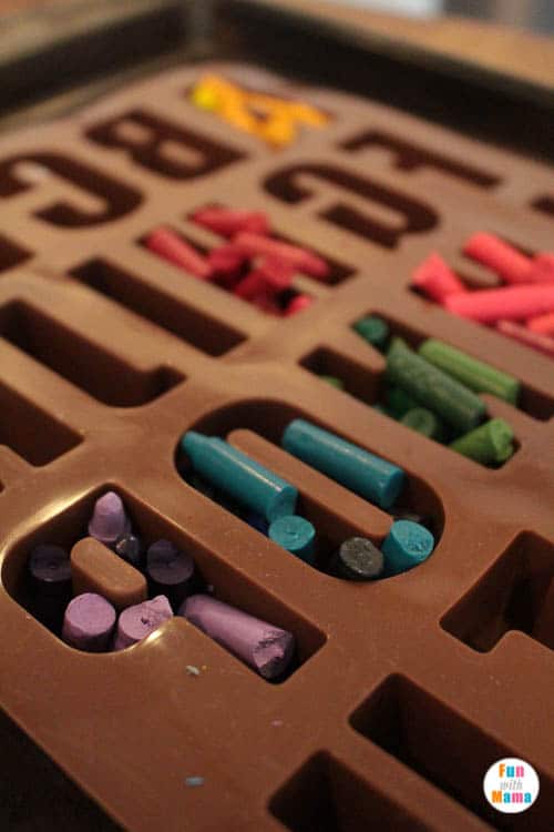 adding crayons to mold