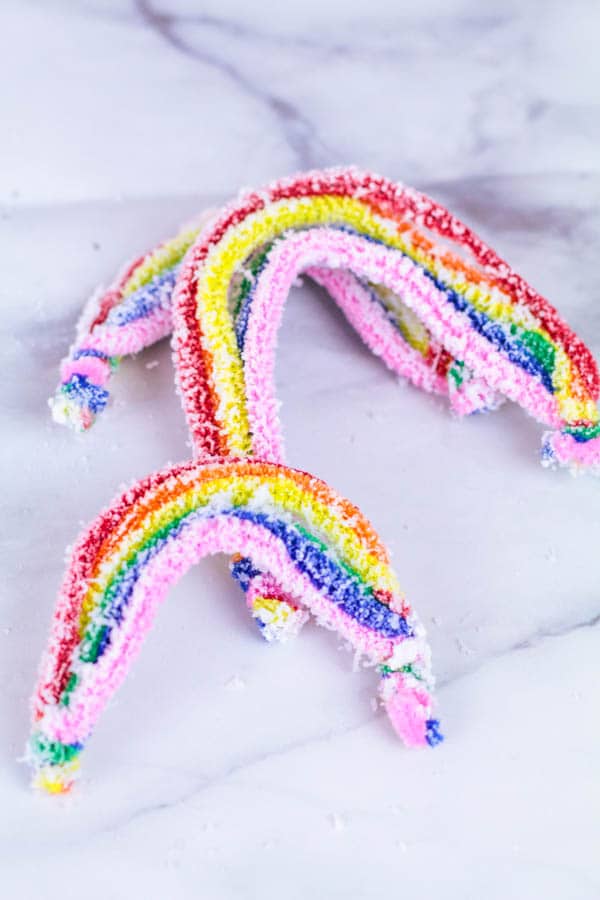 crystals and pipe cleaner that look like rainbows 