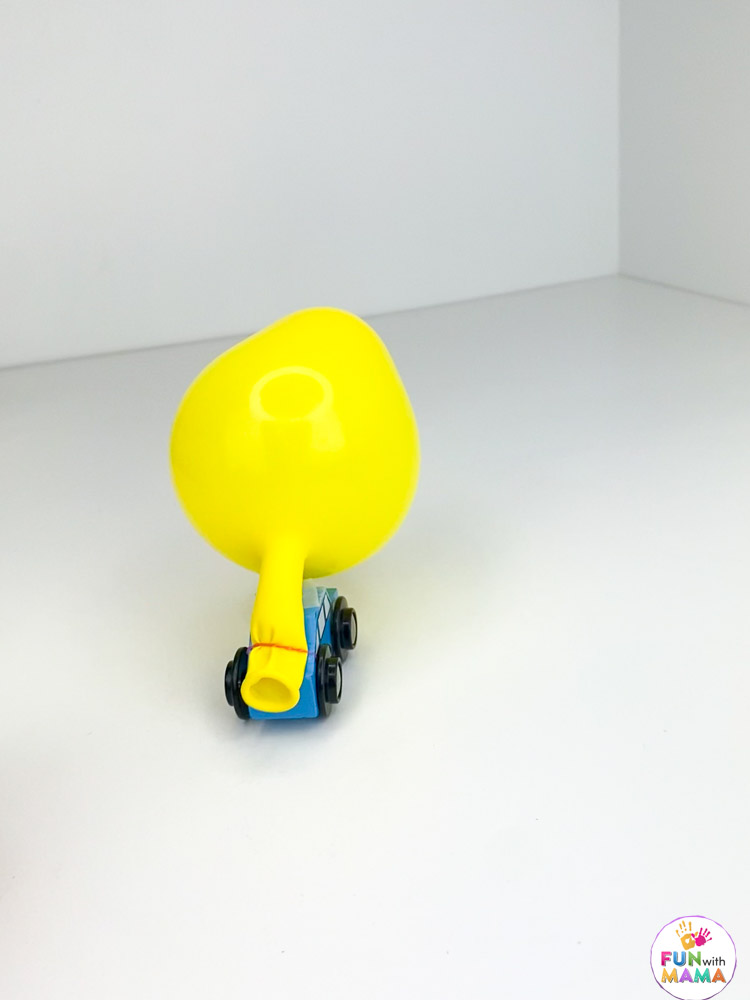 balloon on a toy car