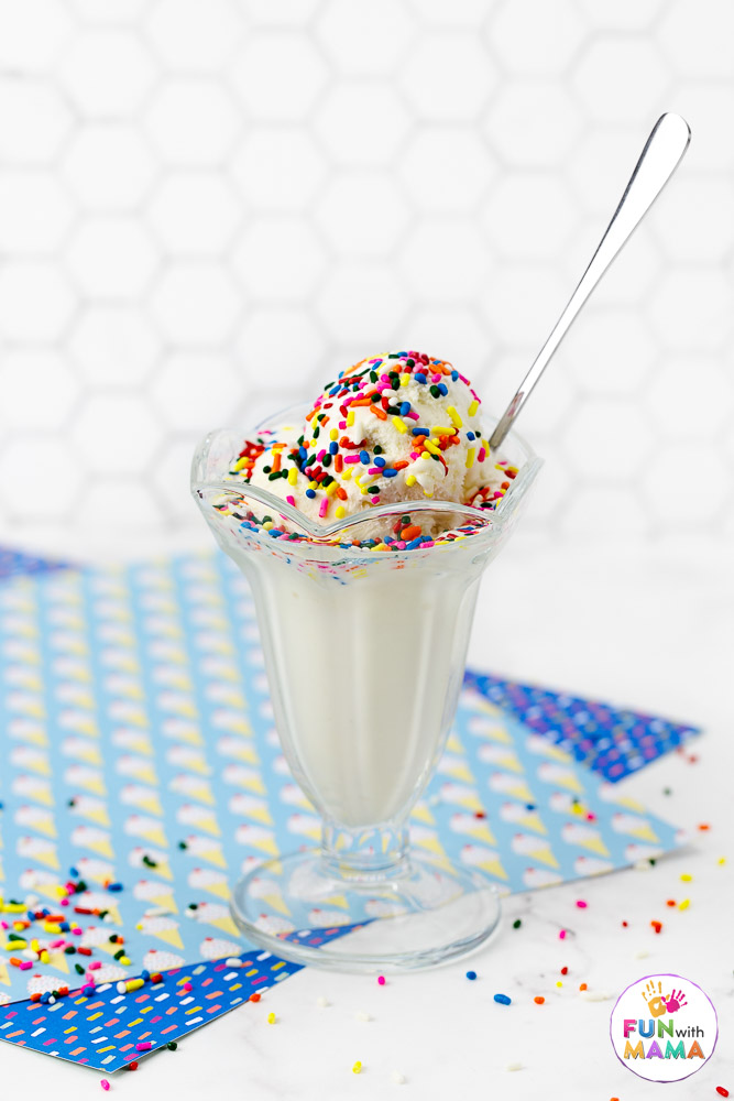 ice cream made in a bag in a cup with sprinkles and a spoon