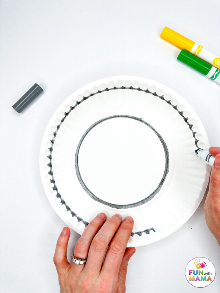 drawing a race track on paper plates